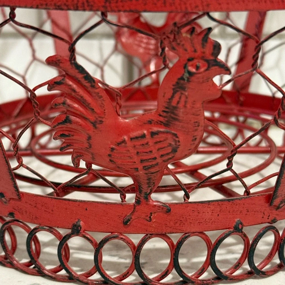 Red Rooster red wired metal basket approximately 7” diameter
